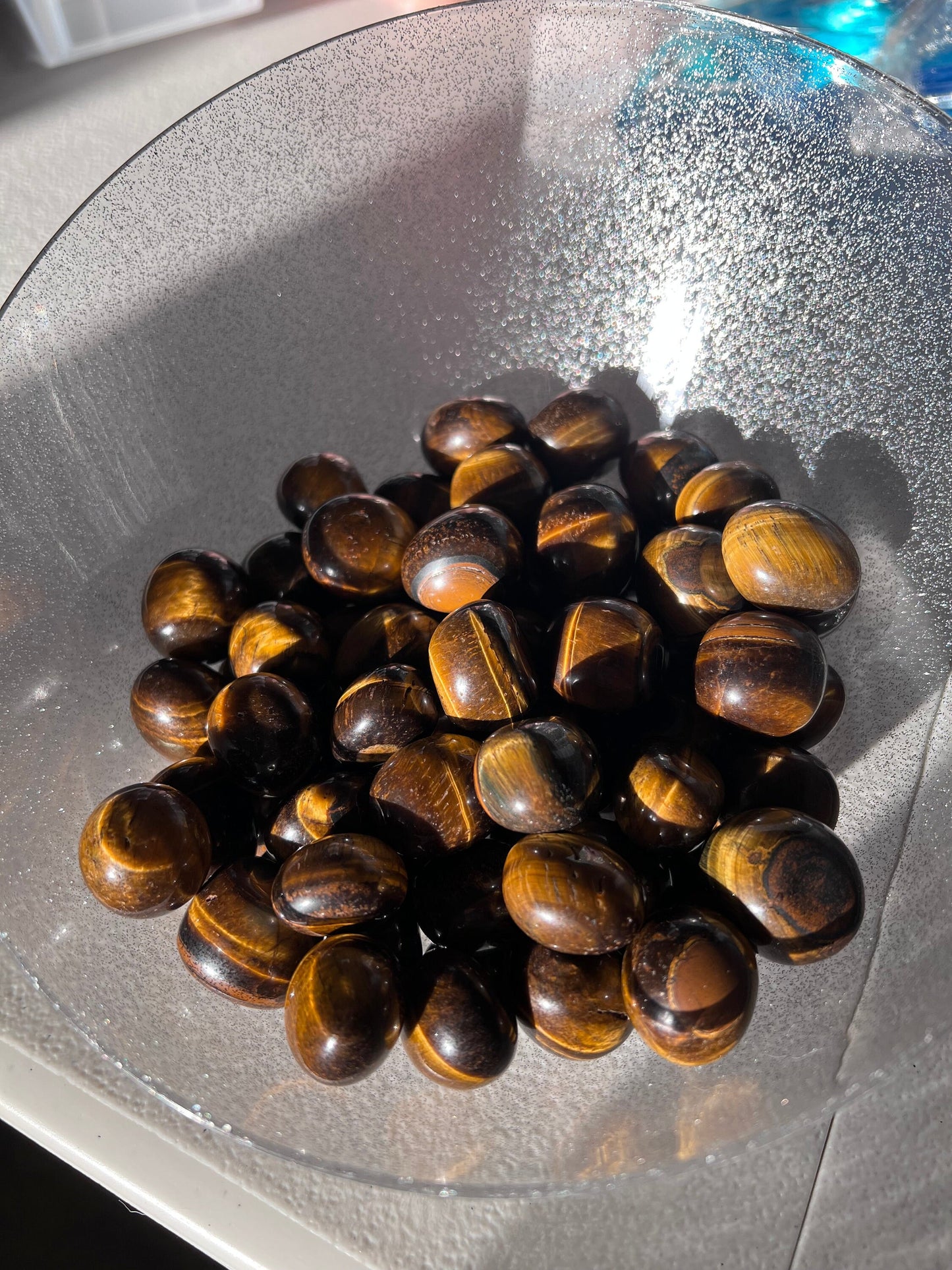 Stunning Tiger's Eye Crystal Tumbles in natural sunlight