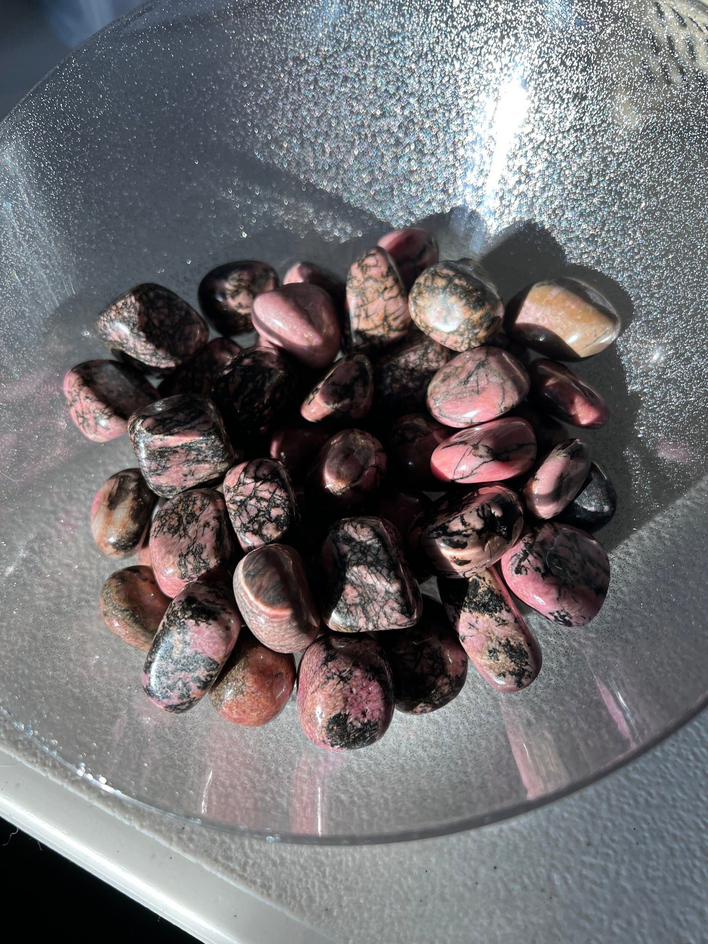 Stunning Rhodonite Crystal Tumbles in natural sunlight